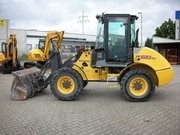  Фронтальный погрузчик New Holland W 60 TC